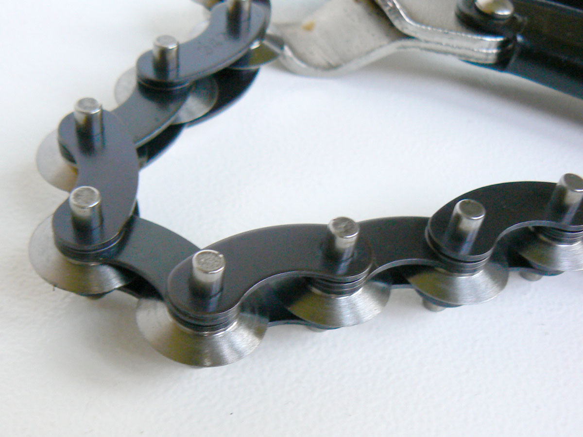 Řezák výfukového potrubí řetězový,  do průměru 85 mm, Triumf